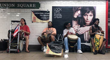 Afrikumba Utibé Drummers perform in the subway at Union Square Station